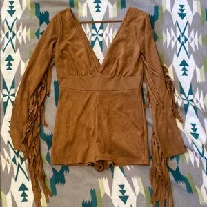Lil Bee’s Bohemian fringe bodysuit